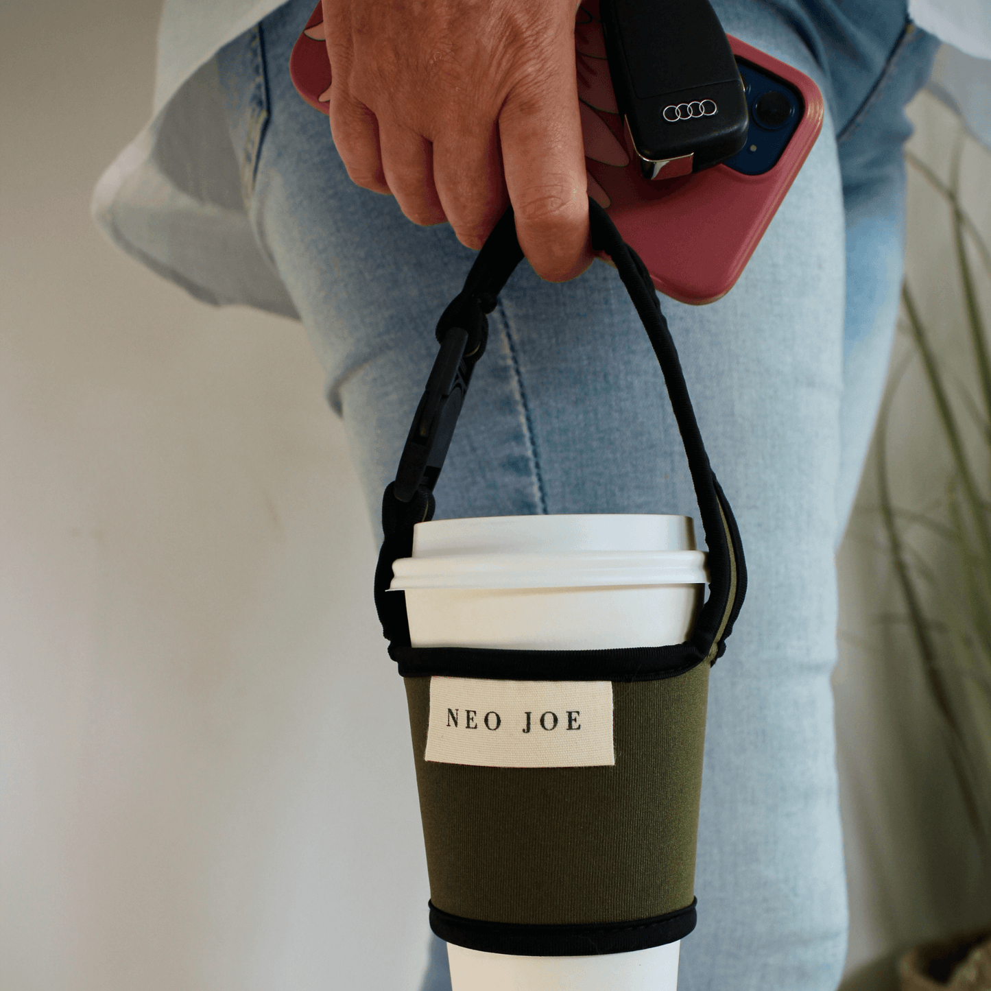 COFFEE SLING IN KHAKI WITH BLACK TRIM