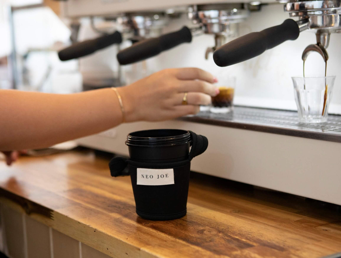 COFFEE SLING IN BLACK WITH BLACK TRIM